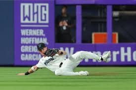 Miami Marlins players preparing for a critical game against the Cincinnati Reds