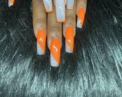 Hình ảnh về Orange White nail design