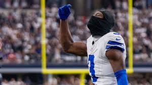 Brian Burns celebrating a play on the field