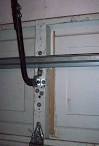 Garage door arm bracket