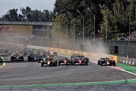 Race start: Spectacular four wide sends Verstappen off on the grass