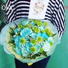 Image result for karangan bunga mawar biru