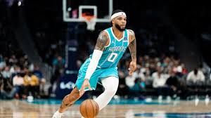 Hornets Defeat Nets in Season Opener: Miller's Return and Rookie Debuts