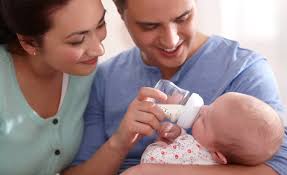Image result for baby eating bottle