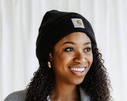 صورة woman wearing a beanie hat