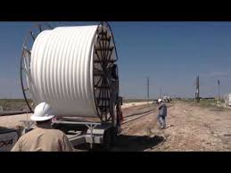 Polyflow Self Loading Trailer Unspooling - YouTube