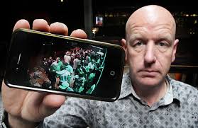 IN THE LOOP: Ross Herrick, of Dux Live in Lincoln Rd, with the iPhone app that lets him monitor security footage. - 8554761