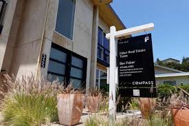 Real Estate Giants Compass and Zillow Fight Over the Future of the Market