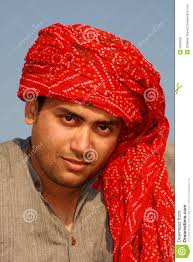 A young man with red turban from an Indian village. MR: YES; PR: NO - young-man-red-turban-6933059