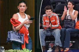 Kylie Jenner totes $63K ‘Knicks blue’ Birkin bag to playoff game with Timothée Chalamet
