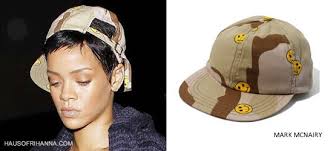 Last night she kept her look simple with dark skinny jeans, a tank top and Mark McNairy&#39;s smiley face camouflage cap. The night before she was spotted in a ... - mark-mcnairy