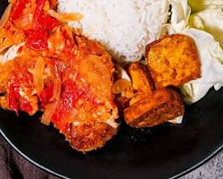 Gambar Ayam Geprek Mbledos Bu Rum, a crispy fried chicken crushed and mixed with spicy sambal