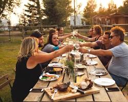 Image of family gathered around a table