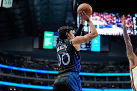 Mavericks heat up late, freeze out Warriors, 123-115