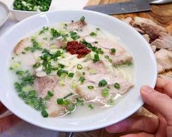 Jeju Kitchen Meat Noodles with a bowl of hearty noodle soup的圖片