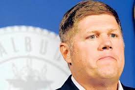 Darren White pauses while telling the media about his wife&#39;s car crash during a press conference at the Mayor&#39;s Office on Monday. On Friday, White announced ... - a01_jd_16july_white1_CMYK