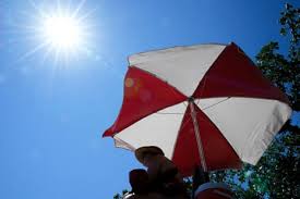 Lifeguard watches over beach during extreme heat