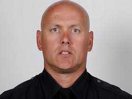 The officer has two breathing tubes in his chest to help drain blood. Jenkins was shot once in the face and once in the left clavicle. - AP110404028240