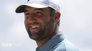 Scottie Scheffler celebrates winning the FedEx Cup at the Tour Championship