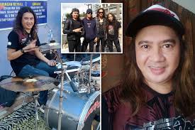 Raja Azreen Raja Talib performing with Malaysian rock band Meditasi