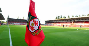 Wrexham vs Norwich halted for medical emergency as players ordered off pitch