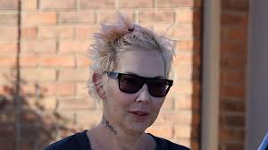 Eminem's ex wife Kim Mathers enters plea 'after drunk driving arrest' and crashing car with kids inside