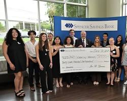 Image of students managing a school savings bank