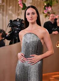 Renate Reinsve’s Shimmering Metallic Golden Globes Gown Is a Total Showstopper