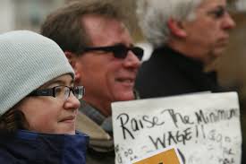 25, to call for a raise in the state&#39;s minimum wage. Op-ed contributors Emily Martin and Arjun Sethi say &#39;America&#39;s workers are shouldering ... - 0409-NY-minimum-wage-protests_full_600