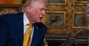 Trump promises to guard against "bad Santa" and touts "clean, beautiful coal" in Christmas Eve calls with kids