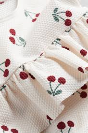 Swimsuit with Flounce - Cream/strawberries - Kids | H&M US