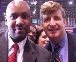 Above: Congressman Patrick J. Kennedy of Rhode Island (right) posed for a photo with Teddy Fikre during a rally at American University in Washington, - teddy_and-keneddy_inside