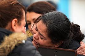 AURORA, CO - MARCH 24: Blanca Palomino hugs a photo of her son, Juan Carlos Dominguez-Palomino, who was killed earlier in a fatal crash, Monday, March 24, ... - 480336265-blanca-palomino-hugs-a-photo-of-her-son-juan-gettyimages