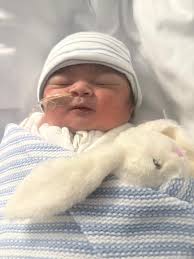 This is the face of the baby whose death is being probed at inquest over three days