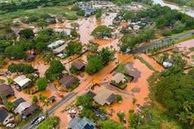 Aerial Footage Shows Floodwaters Gush Over 120-Year-Old Dam