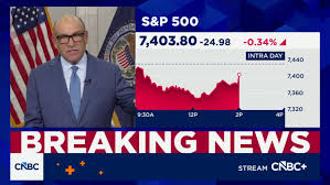 Divided Fed holds interest rates steady, but three members voted to hike