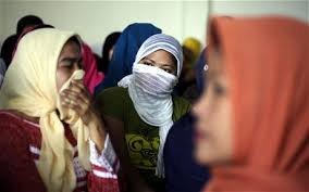 Indonesian migrant workers prepare to travel to Saudi Arabia in Bekasi, West Java, Indonesia Photo: EPA. 7:00AM BST 23 Jun 2011 - Sapubi_1927898c