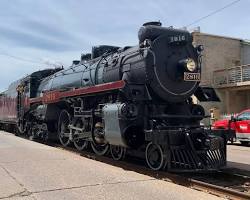 Image of steam locomotive pulling a train