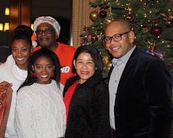 Image of Simone Biles with her parents and siblings