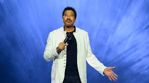 Lionel Richie performing on stage