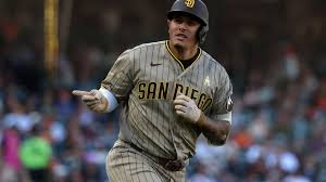 San Diego Padres celebrate an 8-7 win over the Colorado Rockies at Coors Field