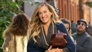 Sarah Jessica Parker flashes her megawatt smile as she films And Just Like 
That in New York City