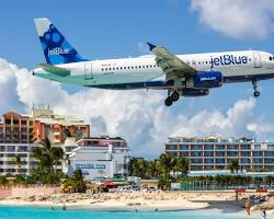 Image of JetBlue airplane flying over various destinations