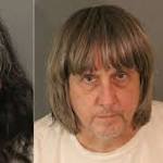 Parents charged after siblings found