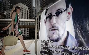 Snowden sought Booz Allen job to gather evidence on NSA surveillance. A banner displayed in support of Edward Snowden in Central. Photo: AFP - snowhk0624