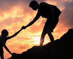 person helping another person