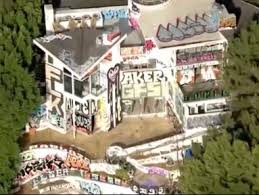 Squatters and taggers target abandoned multi-million dollar home in 
Hollywood Hills