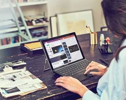 Image of Employee working on laptop at home