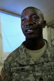 Staff Sgt. John Okumu mentors youth during Natural Fire 10, a humanitarian exercise in Uganda. - size0-army.mil-62795-2010-01-27-160138