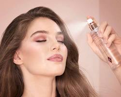 Image of applying setting spray makeup